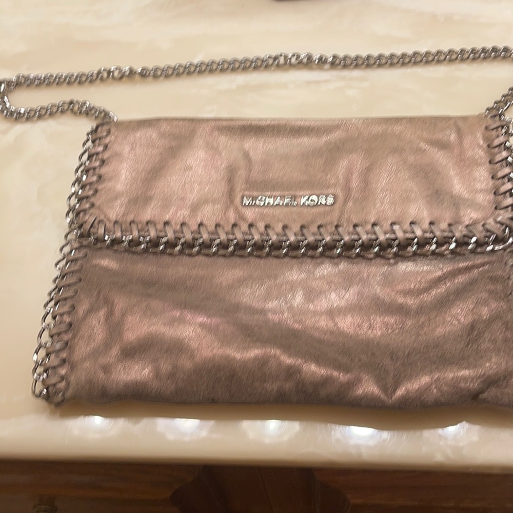 Michael Kors metallic handbag.